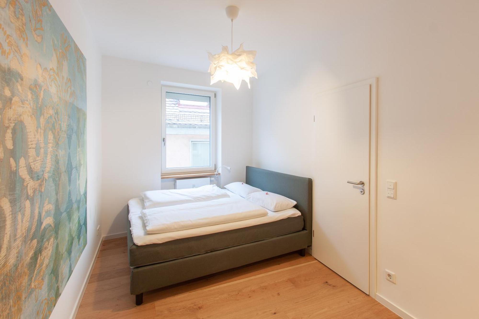 Appartement Juliusliving - Modernes Wohnen An Der Juliuspromenade à Wurtzbourg Chambre photo